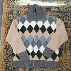 Diamond patterned turtleneck sweater
